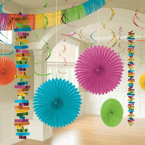 A party room decorated with a variety of multicoloured party decorations