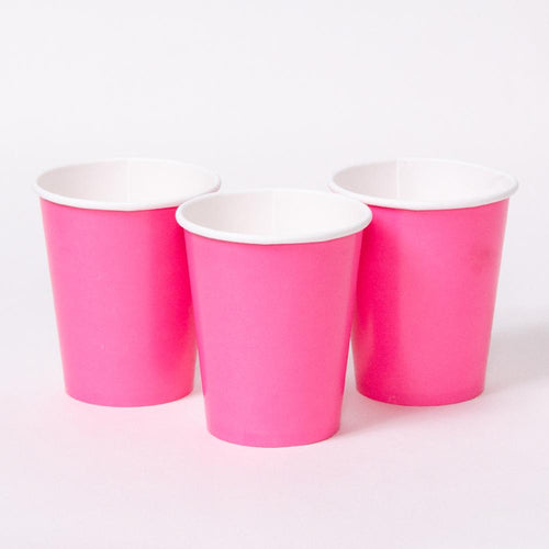 3 pink party cups with white rims