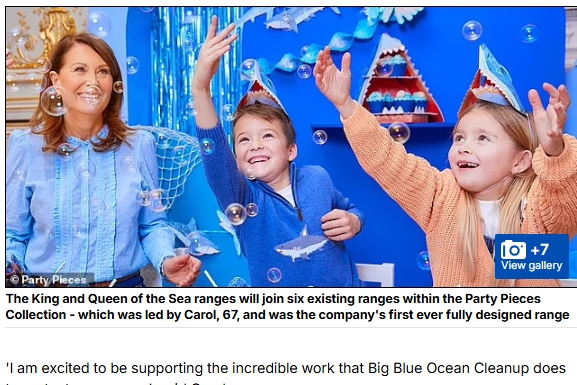 Woman and two children wearing party hats with a blue background
