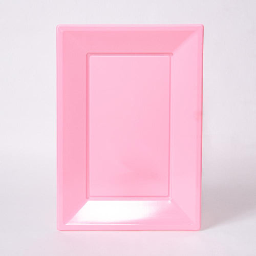 A pale pink rectangular plastic serving tray for party food