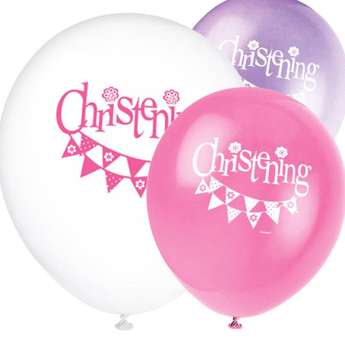 A bunch of 3 pink balloons with a garland print and Christening lettering