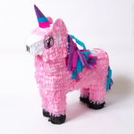A pink unicorn-shaped party pinata