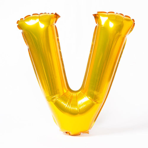 A shiny metallic gold letter "V" balloon