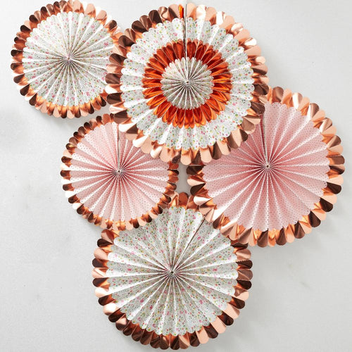 A set of pink and white pastel party fans with a rose gold foil trim