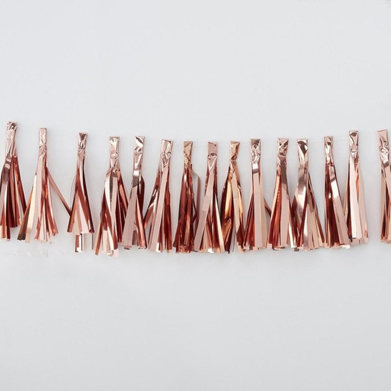 A rose gold party tassel garland