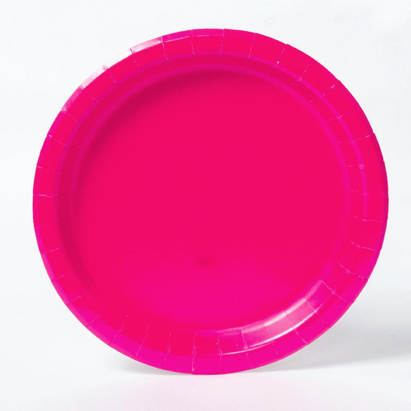 A bright pink paper party plate