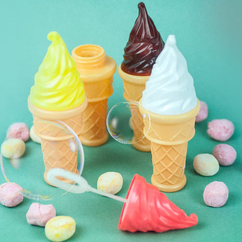 A set of ice cream-shaped bubble liquid tubes surrounded by party sweets