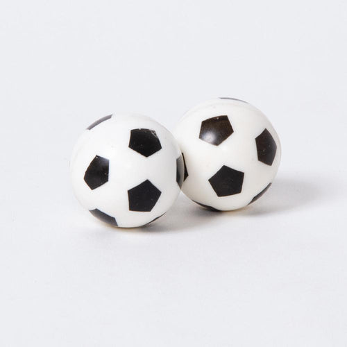 A pair of bouncy balls in the shape and stlye of the classic black and white football